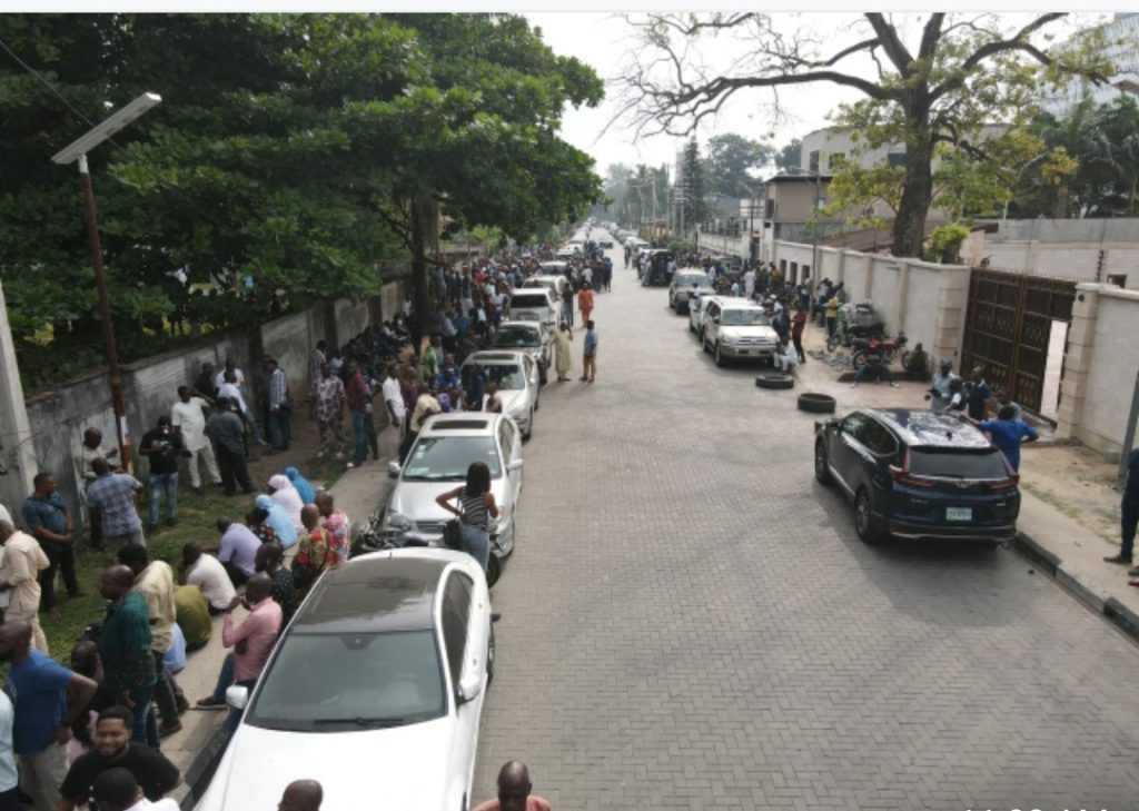 EFCC public auction: Thousands of Nigerians jostle for 435 cars in Lagos
