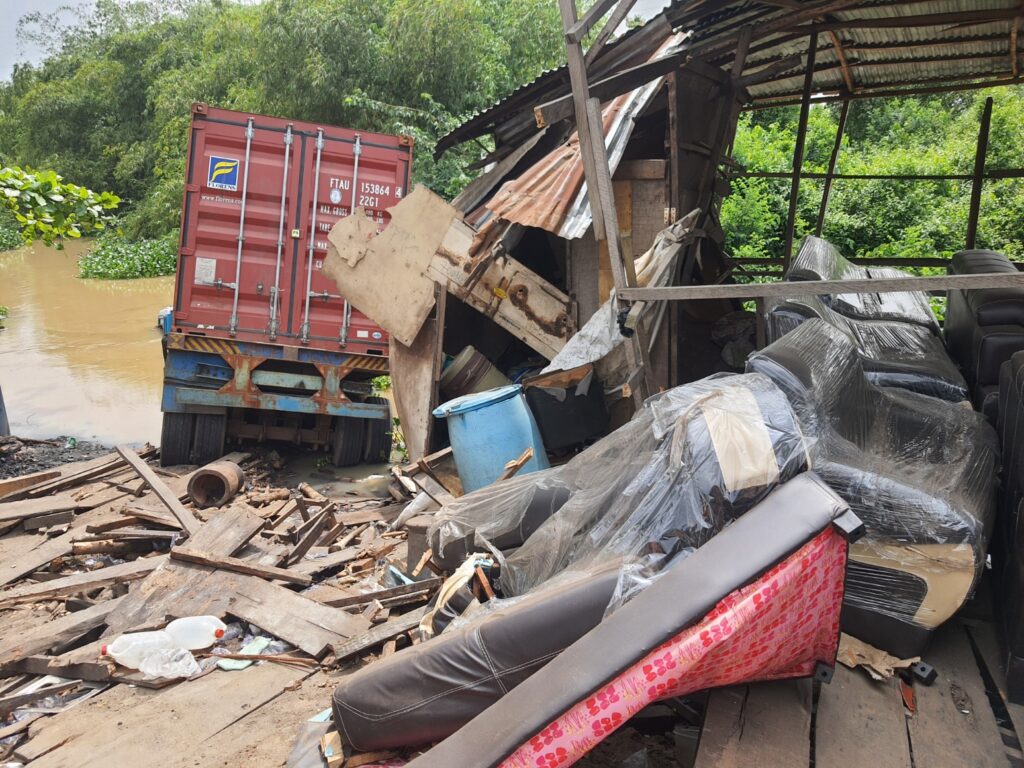 Truck crashes into water, destroys goods worth millions of naira