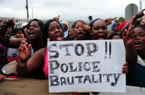 Hoodlums attack protesters in front of CBN in Abuja
