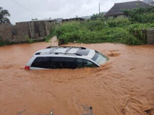 Communities lament as flood submerges vehicles, renders road impassable
