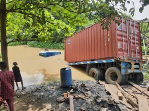 Truck crashes into water, destroys goods worth millions of naira