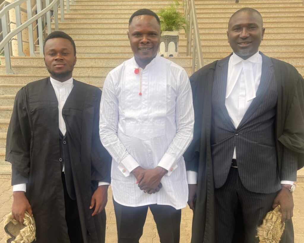 Onitsha, flanked by his lawyers after the court session