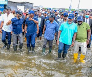 Sanwo-Olu wades through floods, pledges speedy drainage fixes